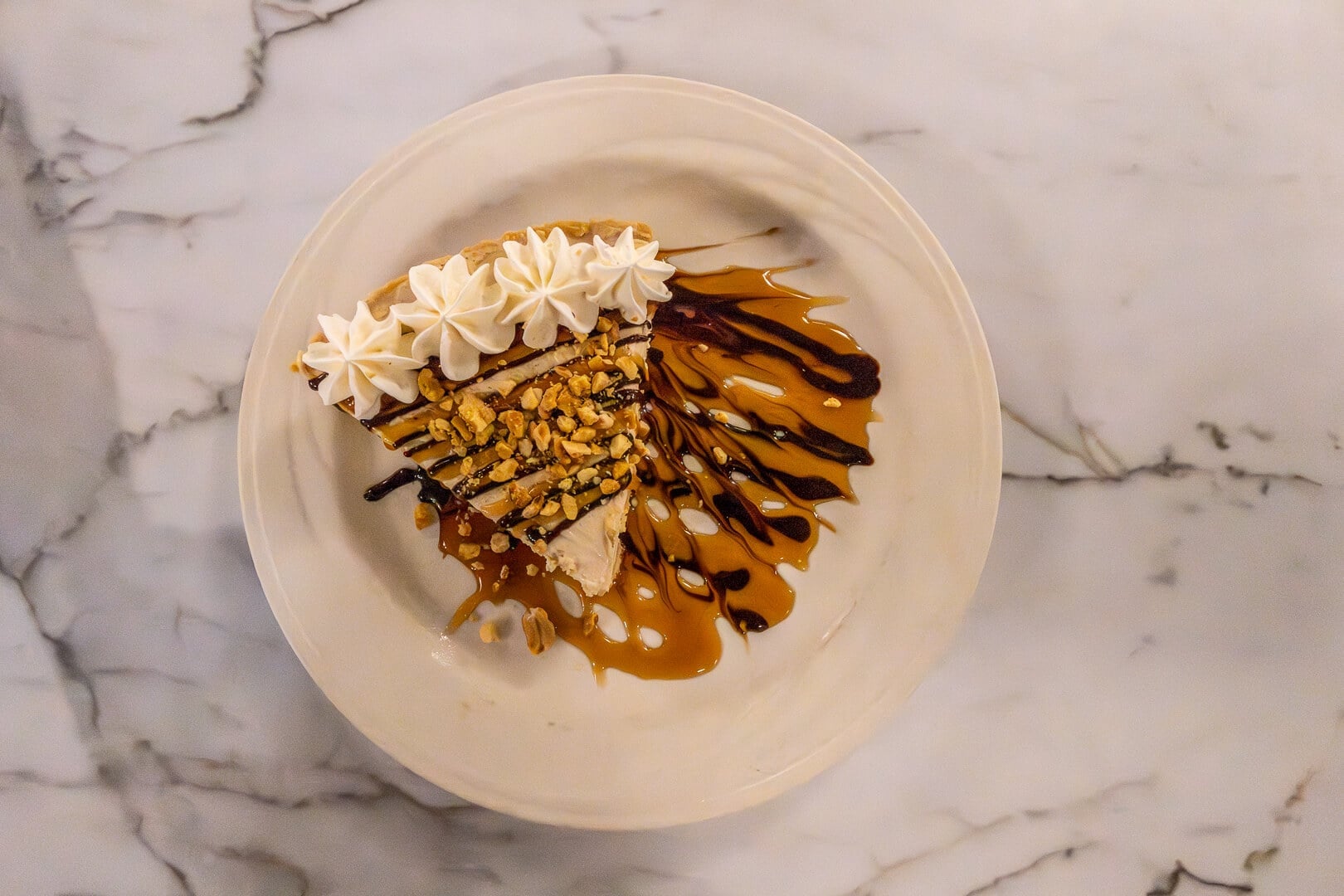 Dessert Plate with Caramel Drizzle and Whipped Cream at an Independent Living Facility