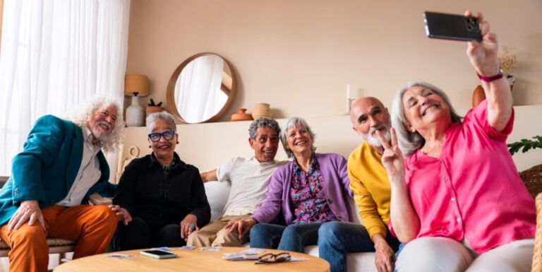 Elderly Friends Taking Selfie Together in Independent Living Facility
